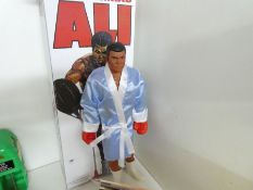 Muhammad Ali action figure in reproduction box etc