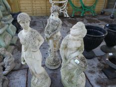 Three stone effect garden statues of female figures