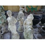 Three stone effect garden statues of female figures