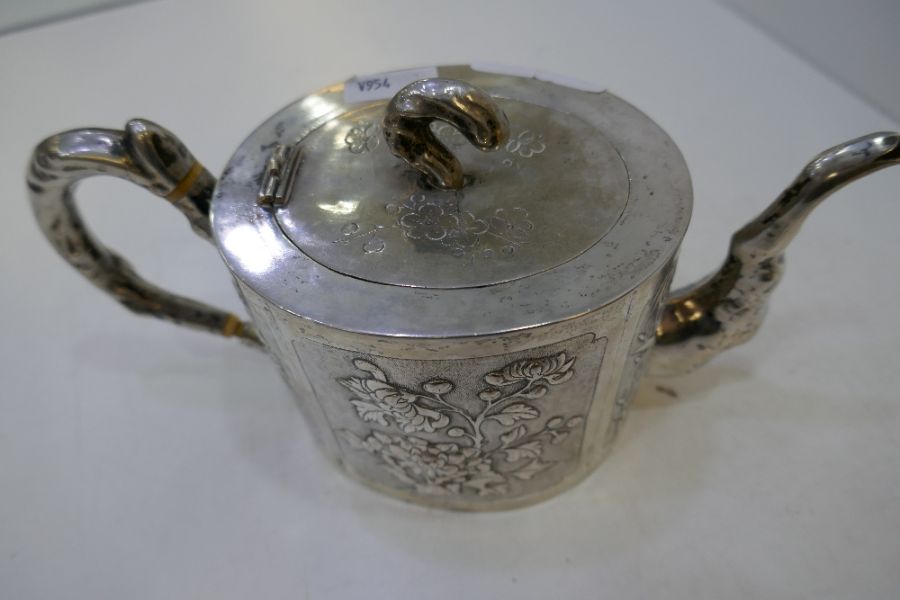 A Chinese teapot marked Kucheung with floreated design embossed on the body. Central vacant cafonche - Image 5 of 6