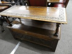 An old carved oak monks bench (106cm).