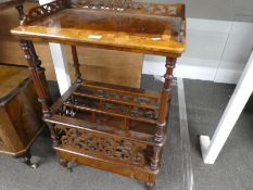A Victorian burr walnut Canterbury having raised shelf with one draw and raised fretwork decoration,