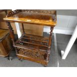 A Victorian burr walnut Canterbury having raised shelf with one draw and raised fretwork decoration,