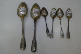 A silver Georgian lot comprising a pair of Georgian silver serving spoons, hallmarked London 1807 Pe