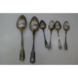 A silver Georgian lot comprising a pair of Georgian silver serving spoons, hallmarked London 1807 Pe