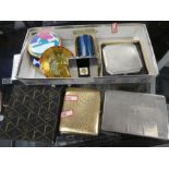 A silver engine turned compact , an 800 silver cigarette case, a yellow metal cigarette case and sun
