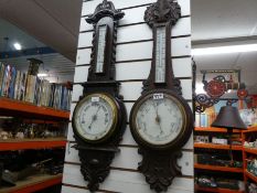 Two wall barometers including thermometers in carved wood AF