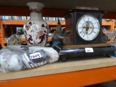 A French movement wooden carriage clock and some porcelain/brass door furniture