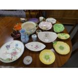 A quantity of 1930s style ceramics including Carlton ware, Clarice Cliff, Pole and Royal Winton