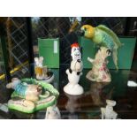 A Beswick figure of Droopy, a Beswick Parakeet and two mouse figures (4)