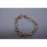 9ct yellow gold geometric design bracelet, approx 18cm, marked 375, 8.5g approx