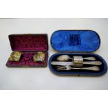 A gorgeous cased set of floriated engraved silver knife, fork, spoon and napkin ring. Very decorativ