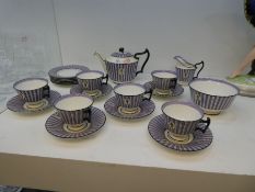 A Royal Doulton Art Deco style tea set for six, having purple - striped decorations, by Robert Alan