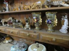 A shelf of animals and sundry