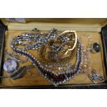 Leather case containing costume jewellery to include silver and marcasite brooch gilt bracelet, past