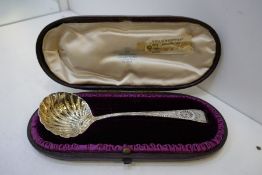 A superb silver Georgian sugar sifter, pretty design, an attractive piece. Cased in a John Cockburn