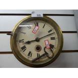A brass mounted clock with key