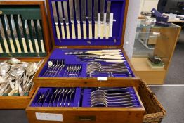 A late Victorian oak canteen of silver plated cutlery by G Plan and Co, Bristol (at least two knives