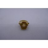 18ct yellow gold dress-ring set with large citrine, marked 4.7g, Size I.