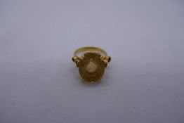 18ct yellow gold dress-ring set with large citrine, marked 4.7g, Size I.