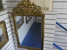 A modern gilt wall mirror having pierced surmount, height 123cms