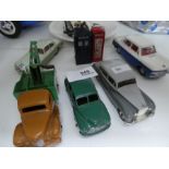 A selection of various Dinky and Corgi model cars, depicting various models