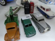 A selection of various Dinky and Corgi model cars, depicting various models