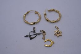 Pair of 9ct gold hoop earrings, AF, and three 9ct gold charms/pendants - one a star with 0.10 points