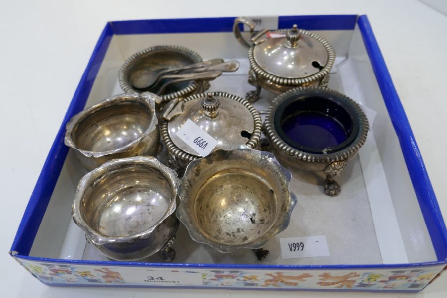 A selection of three silver salts by Asprey and Co Ltd, with lion feet and gadrooned rim. Also with