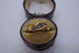 18ct yellow gold dress ring set with 3 blue stones separated by diamond chips - size M, 3g approx ma