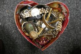 Box of mixed costume jewellery including watches, brooches, wishbone etc