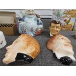A modern Chinese Buddha, 2 face masks of American actors and a John F Kennedy character jug