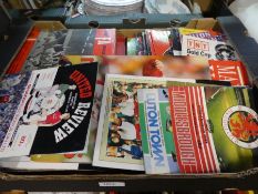 A tray of old Football programmes and similar mainly related to Manchester United