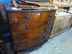 A Georgian mahogany bow front chest having two short and three long drawers