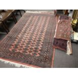 Six modern Bokhara rugs of various sizes, the largest 235 x 158cms