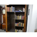 Four shelves of antiquarian and later books including travel and medicine