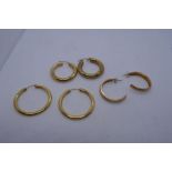2 Pairs of 9ct yellow gold hoop earrings marked 375 and another unmarked pair of hoops, lot weight 6