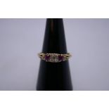 18ct diamond and ruby set gypsy ring with 4 central diamonds flanked with rubies and diamond c