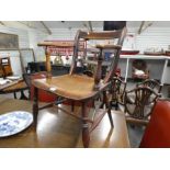 An early 19th Century, Kitchen armchair with elm seal.