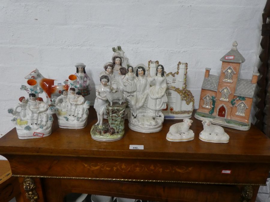 A quantity of Staffordshire figural groups and similar.