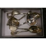 Silver medallion on chain, three silver teaspoons etc