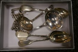 Silver medallion on chain, three silver teaspoons etc