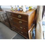 An antique Rosewood and Mahogany chest having four long graduated drawers bears label for John Murph