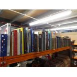 A shelf of antiquarian books and others