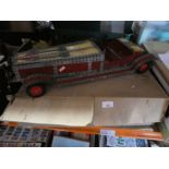 An old Meccano model car and a box of Meccano including paperwork