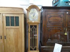 An early 20th century oak longcase clock having Westminster, Whittington and St Michael chimes, the