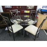 Contemporary glass top circular dining table on metal base and a set of 4 matching chairs