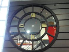 Modern circular wall mirror in the form of a clock