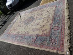 A large early 20th Century carpet having central spandrel with floral border, 445x331cm