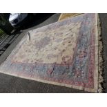 A large early 20th Century carpet having central spandrel with floral border, 445x331cm